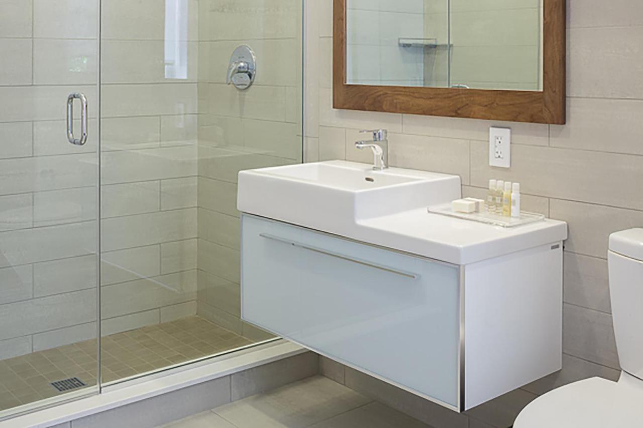 Revolution Loft Two Double Beds Bathroom in Room